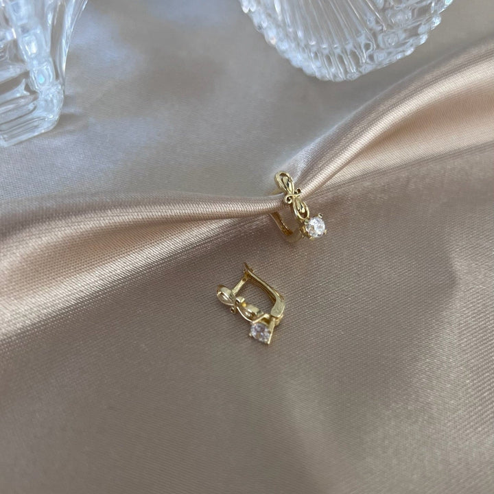 Goldsteckerohrringe