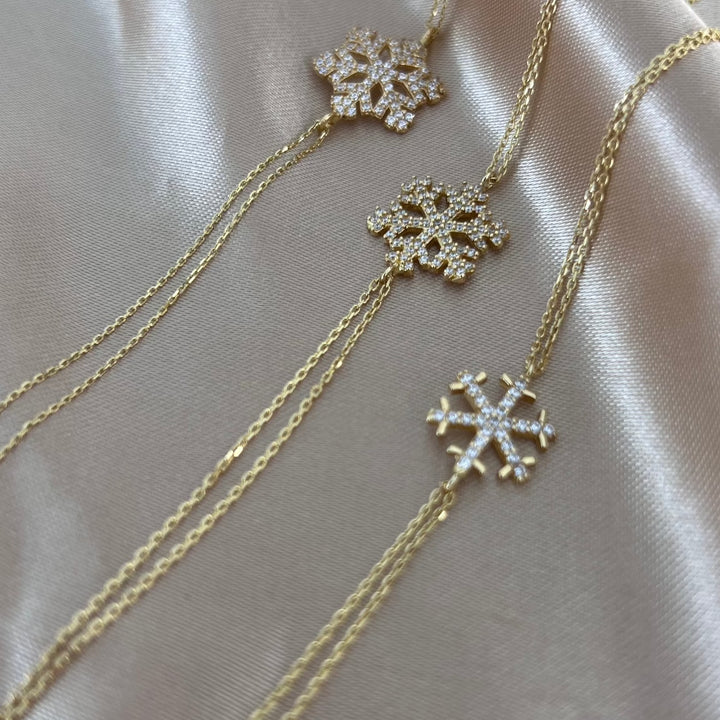 Schneeflocke Goldarmband