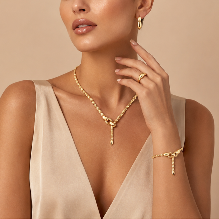 VIERTEILIGES GOLDSET IM KNOTEN-DESIGN MIT ANHÄNGER